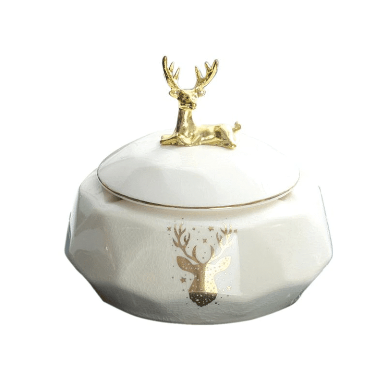 Cendrier céramique anti-odeur blanc crème, figurine cerf doré, aspect craquelé.